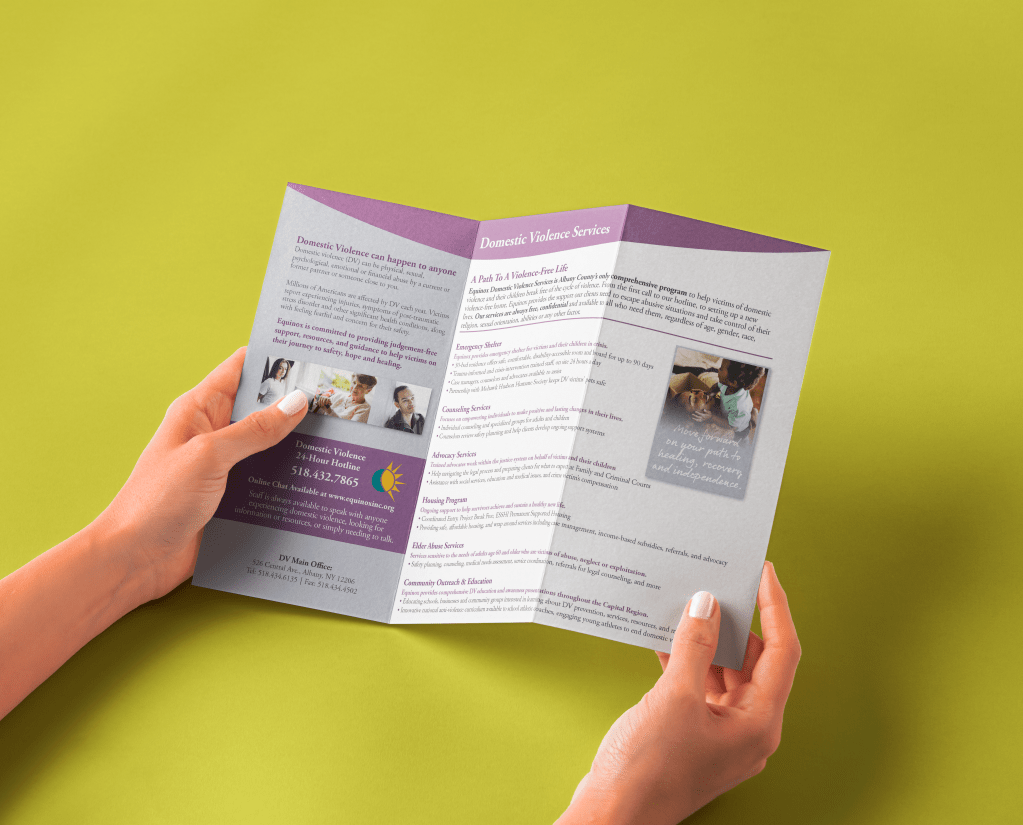 Purple and white DV Awareness brochure.